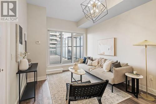 329 - 30 Shore Breeze Drive, Toronto, ON - Indoor Photo Showing Living Room