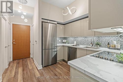 329 - 30 Shore Breeze Drive, Toronto, ON - Indoor Photo Showing Kitchen