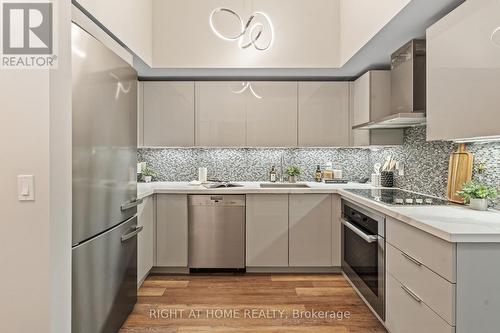 329 - 30 Shore Breeze Drive, Toronto, ON - Indoor Photo Showing Kitchen With Upgraded Kitchen