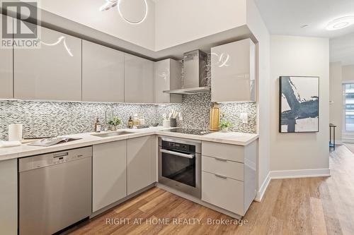 329 - 30 Shore Breeze Drive, Toronto, ON - Indoor Photo Showing Kitchen With Upgraded Kitchen