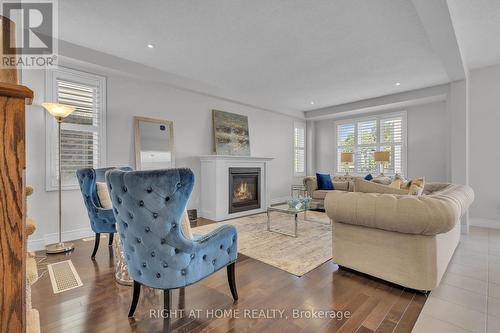 321 Carriage Way, Waterloo, ON - Indoor Photo Showing Living Room With Fireplace