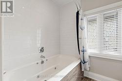 MAIN BATH WITH DEEP SOAK JACUZZI TUB - 