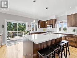 CUSTOM KITCHEN WITH WATERVIEWS &  WALK OUT TO DECK - 