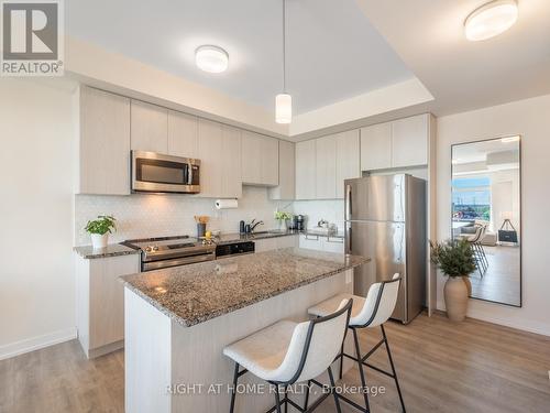 403 - 2550 Castlegate Crossing, Pickering, ON - Indoor Photo Showing Kitchen With Stainless Steel Kitchen With Upgraded Kitchen