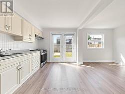 Kitchen and view of yard - 