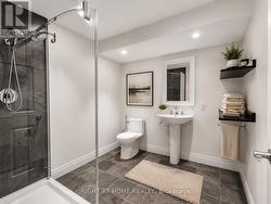 Finished Lower Level Bathroom (Virtually Staged) - 