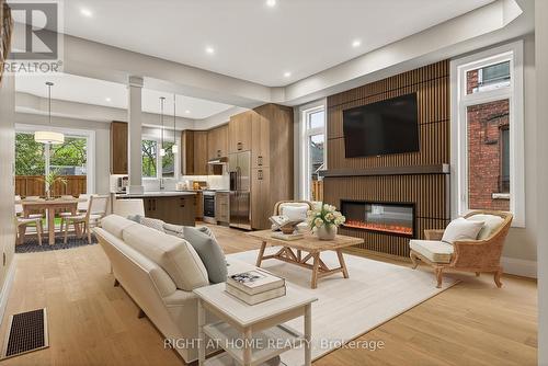 Open Concept living/dining area w/fireplace - 279 Hess Street S, Hamilton, ON 