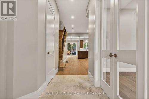 Entry way with 2 piece bath and front closet - 279 Hess Street S, Hamilton, ON 