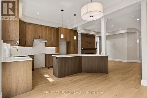 Large Centre Island with overhead fixtures - 279 Hess Street S, Hamilton, ON 