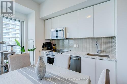 1413 - 30 Shore Breeze Drive, Toronto, ON - Indoor Photo Showing Kitchen With Upgraded Kitchen