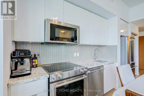 1413 - 30 Shore Breeze Drive, Toronto, ON - Indoor Photo Showing Kitchen With Stainless Steel Kitchen With Upgraded Kitchen