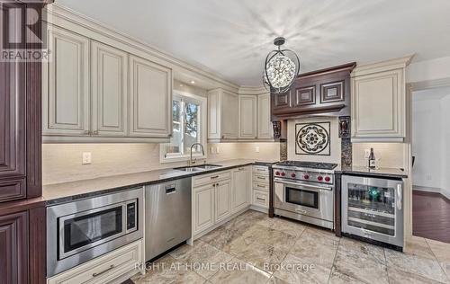 Kitchen with Built-In Appliances and Wine Fridge - 1665 Asgard Drive, Mississauga, ON - Indoor Photo Showing Kitchen With Double Sink With Upgraded Kitchen