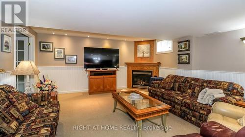 Rec Room/Family Room Gas Fireplace - 36 Benjamin Lane, Barrie, ON - Indoor Photo Showing Living Room With Fireplace