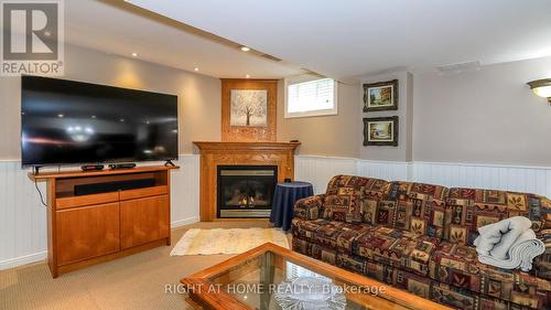 Cozy Family Room - 36 Benjamin Lane, Barrie, ON - Indoor Photo Showing Living Room With Fireplace