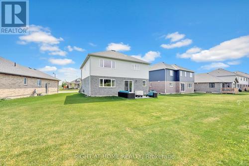 135 Stephenson Way, Minto, ON - Outdoor With Backyard With Exterior
