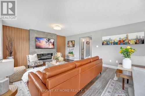 135 Stephenson Way, Minto, ON - Indoor Photo Showing Living Room With Fireplace