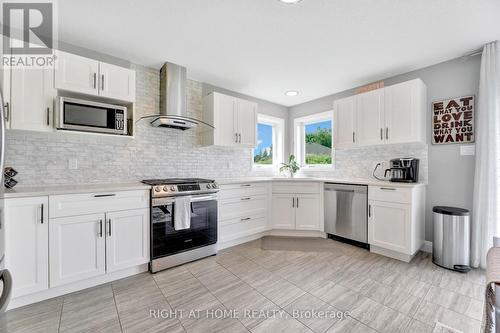 135 Stephenson Way, Minto, ON - Indoor Photo Showing Kitchen With Stainless Steel Kitchen With Upgraded Kitchen