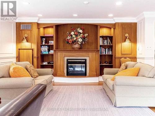 202 - 2000 Creekside Drive, Hamilton, ON - Indoor Photo Showing Living Room With Fireplace