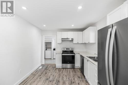 100 Green Mountain Road E, Hamilton, ON - Indoor Photo Showing Kitchen With Stainless Steel Kitchen With Double Sink With Upgraded Kitchen