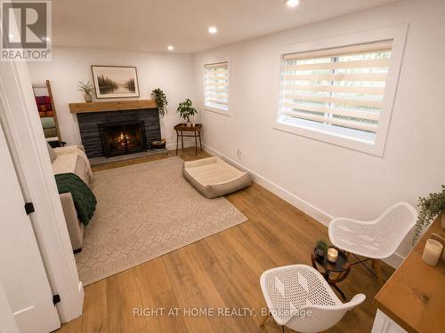 4440 Cosburn Crescent, Burlington, ON - Indoor With Fireplace