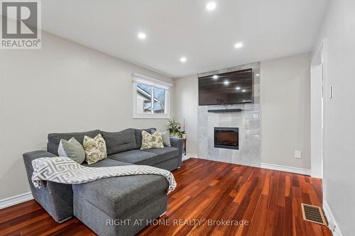56 Hemingway Crescent, Barrie, ON - Indoor Photo Showing Living Room With Fireplace