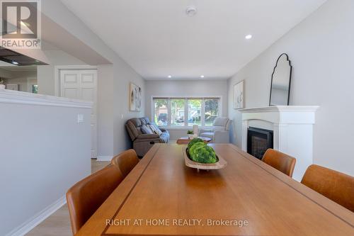 80 Chilton Drive, Hamilton, ON - Indoor Photo Showing Dining Room With Fireplace