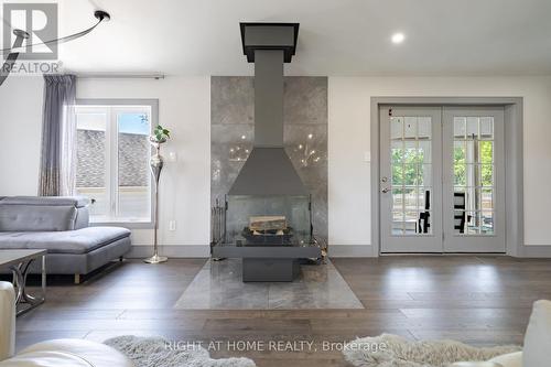 560 Concession Road 15 W, Tiny, ON - Indoor Photo Showing Living Room With Fireplace