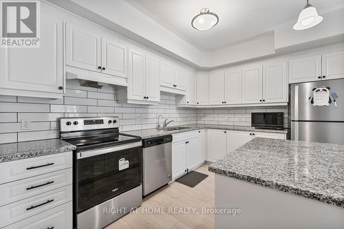 B/26 - 25 Isherwood  Avenue, Cambridge, ON - Indoor Photo Showing Kitchen With Upgraded Kitchen