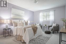 Primary Bedroom Overlooks the Backyard - 
