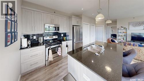 406 1515 Anson Road, Regina, SK - Indoor Photo Showing Kitchen With Stainless Steel Kitchen With Double Sink With Upgraded Kitchen