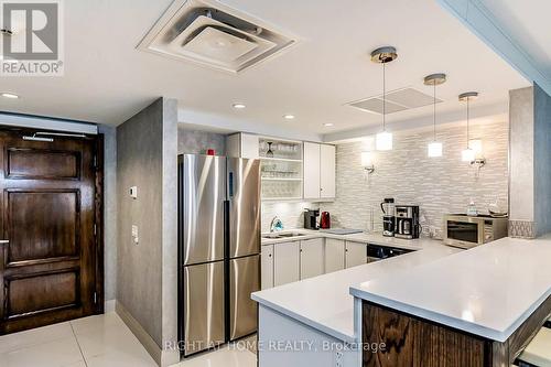 318 - 40 Via Rosedale, Brampton, ON - Indoor Photo Showing Kitchen With Stainless Steel Kitchen