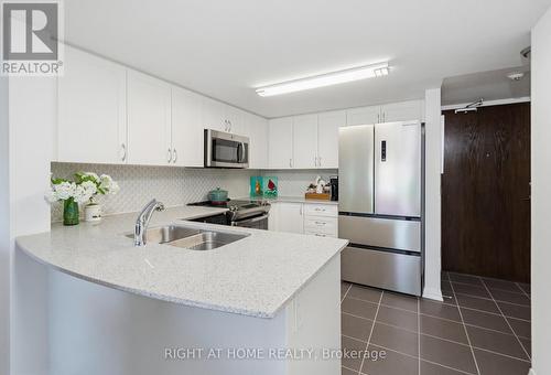 318 - 40 Via Rosedale, Brampton, ON - Indoor Photo Showing Kitchen With Stainless Steel Kitchen With Double Sink