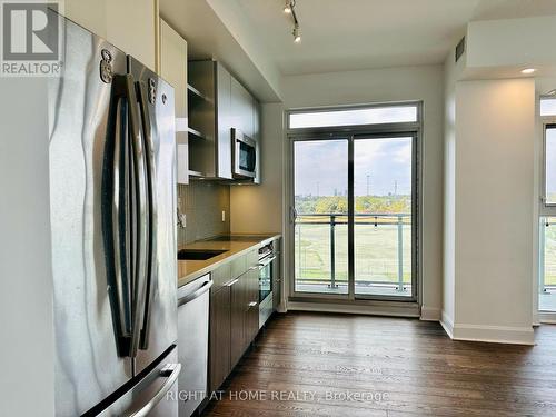 504 - 33 Shore Breeze Drive, Toronto, ON - Indoor Photo Showing Kitchen With Upgraded Kitchen