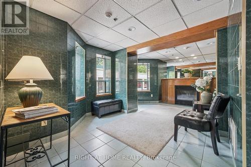 804 - 281 Bristol Street, Guelph, ON - Indoor Photo Showing Other Room With Fireplace