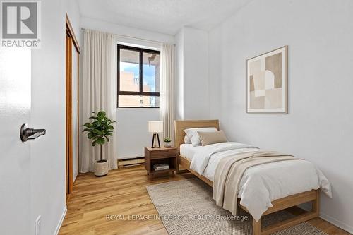 This photo has been virtually staged. - 2001 - 475 Laurier Avenue W, Ottawa, ON - Indoor Photo Showing Bedroom