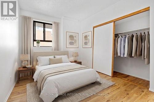 This photo has been virtually staged. - 2001 - 475 Laurier Avenue W, Ottawa, ON - Indoor Photo Showing Bedroom