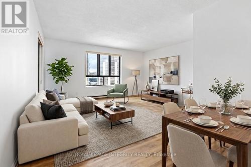 This photo has been virtually staged. - 2001 - 475 Laurier Avenue W, Ottawa, ON - Indoor Photo Showing Living Room