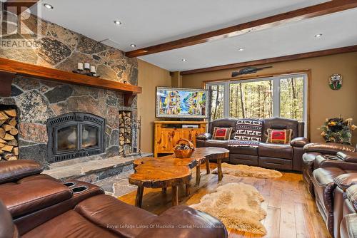 1 - 1041 Summit Road, Muskoka Lakes (Wood (Muskoka Lakes)), ON - Indoor Photo Showing Living Room With Fireplace