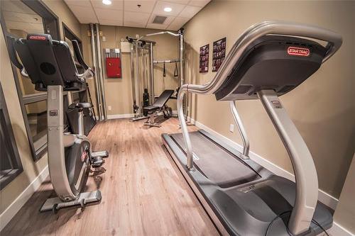 303-25 Van Hull Way, Winnipeg, MB - Indoor Photo Showing Gym Room