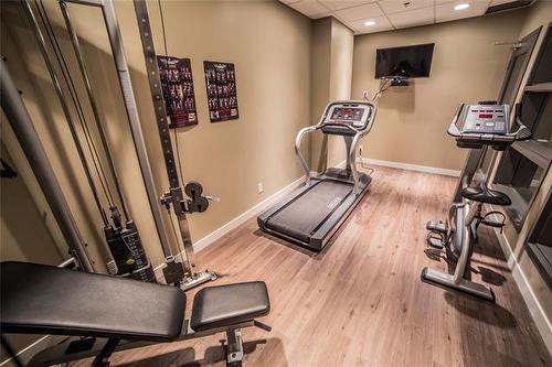 303-25 Van Hull Way, Winnipeg, MB - Indoor Photo Showing Gym Room