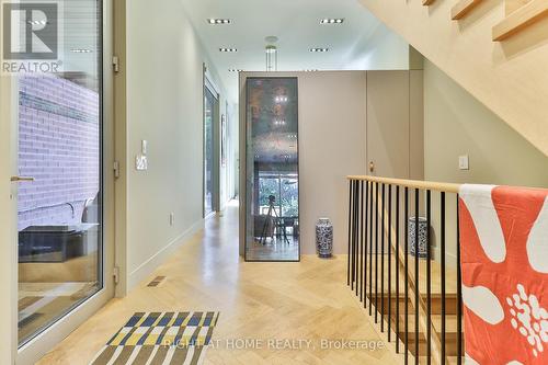 18 Mitchell Avenue, Toronto, ON - Indoor Photo Showing Other Room With Fireplace