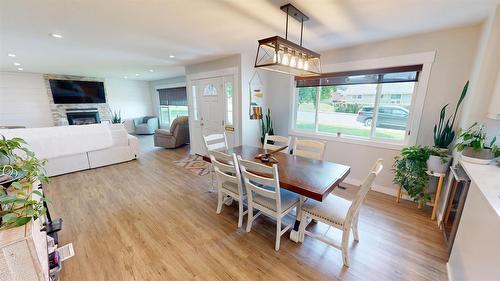 904 9Th Street, Cranbrook, BC - Indoor Photo Showing Dining Room With Fireplace