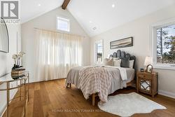 Primary retreat features a vaulted beam ceiling - 