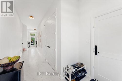 mud room with 3 door access - 67 Charles Tilley Crescent, Clarington, ON - Indoor Photo Showing Other Room