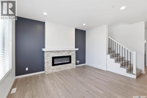 104 Forsey Avenue, Saskatoon, SK - Indoor Photo Showing Living Room With Fireplace