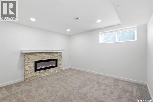 104 Forsey Avenue, Saskatoon, SK - Indoor With Fireplace