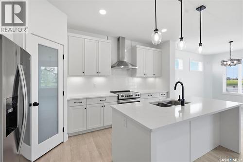 104 Forsey Avenue, Saskatoon, SK - Indoor Photo Showing Kitchen With Double Sink With Upgraded Kitchen