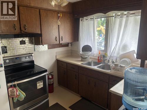 127 Walden Crescent, Regina, SK - Indoor Photo Showing Kitchen With Double Sink