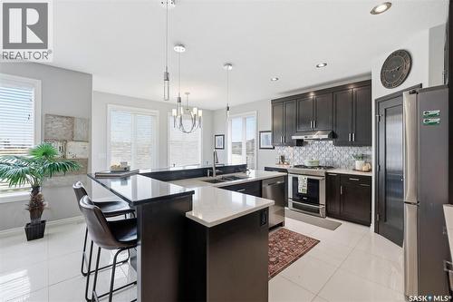 107 Schumacher Bay, Saskatoon, SK - Indoor Photo Showing Kitchen With Upgraded Kitchen