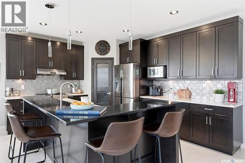 107 Schumacher Bay, Saskatoon, SK - Indoor Photo Showing Kitchen With Upgraded Kitchen